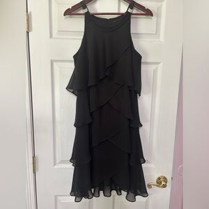 Beautiful ruffle cocktail dress, size 12.  Runs small.